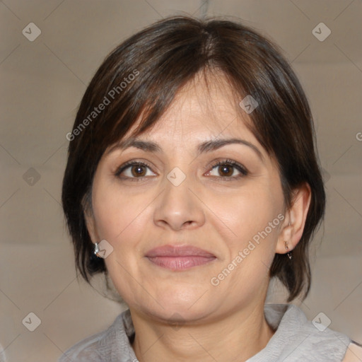 Joyful white adult female with medium  brown hair and brown eyes