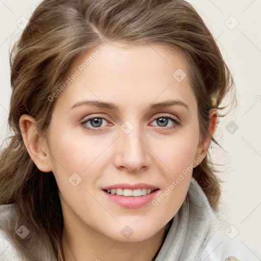 Joyful white young-adult female with long  brown hair and blue eyes