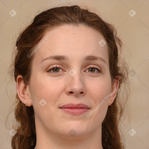 Joyful white young-adult female with medium  brown hair and green eyes