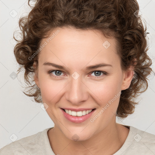 Joyful white young-adult female with medium  brown hair and green eyes