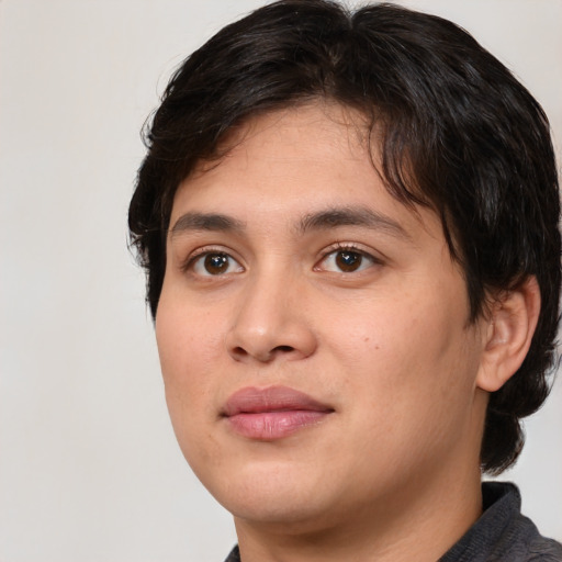 Joyful white young-adult male with medium  brown hair and brown eyes