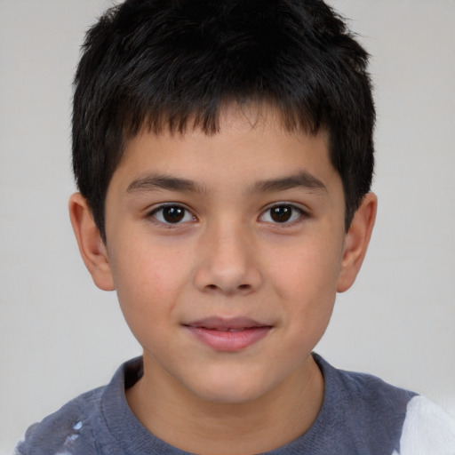 Joyful white child male with short  brown hair and brown eyes