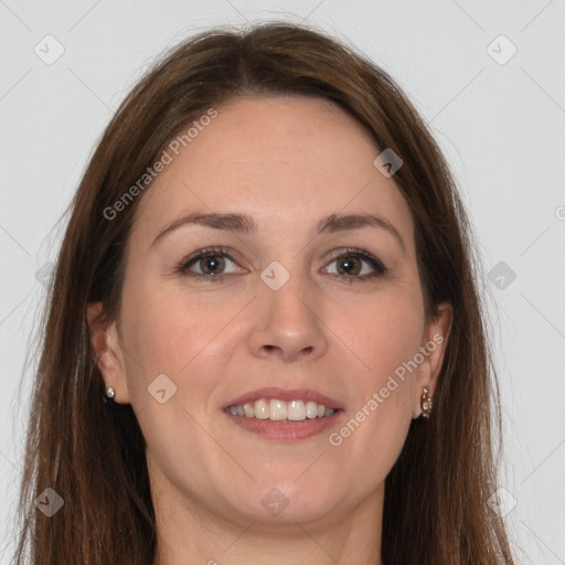 Joyful white young-adult female with long  brown hair and grey eyes