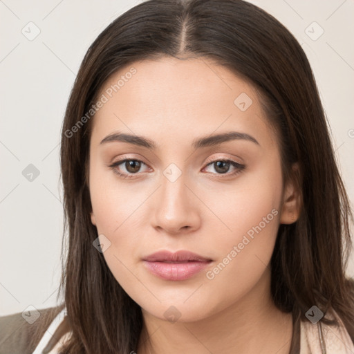 Neutral white young-adult female with long  brown hair and brown eyes