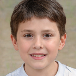 Joyful white child male with short  brown hair and brown eyes