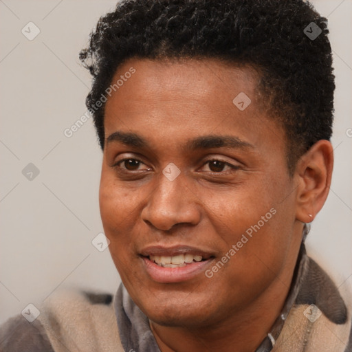 Joyful black young-adult male with short  black hair and brown eyes