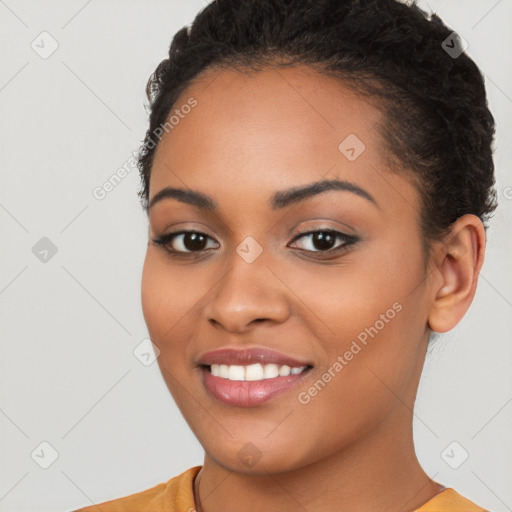 Joyful latino young-adult female with short  brown hair and brown eyes