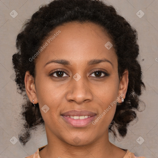 Joyful black young-adult female with medium  brown hair and brown eyes