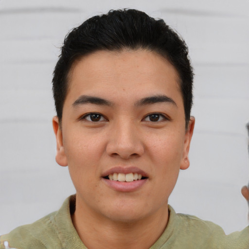 Joyful asian young-adult male with short  brown hair and brown eyes