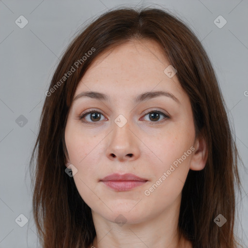 Neutral white young-adult female with long  brown hair and brown eyes