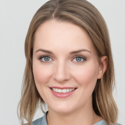 Joyful white young-adult female with medium  brown hair and blue eyes