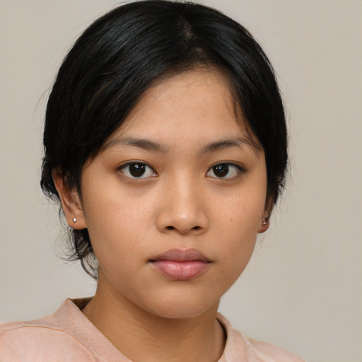 Neutral asian young-adult female with medium  black hair and brown eyes