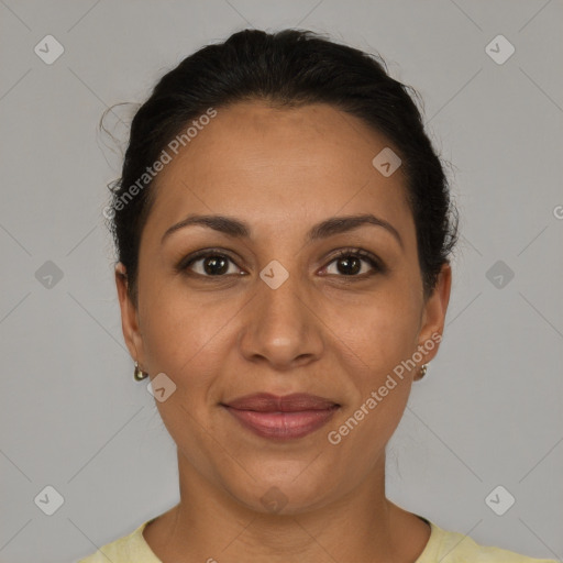 Joyful latino adult female with short  brown hair and brown eyes