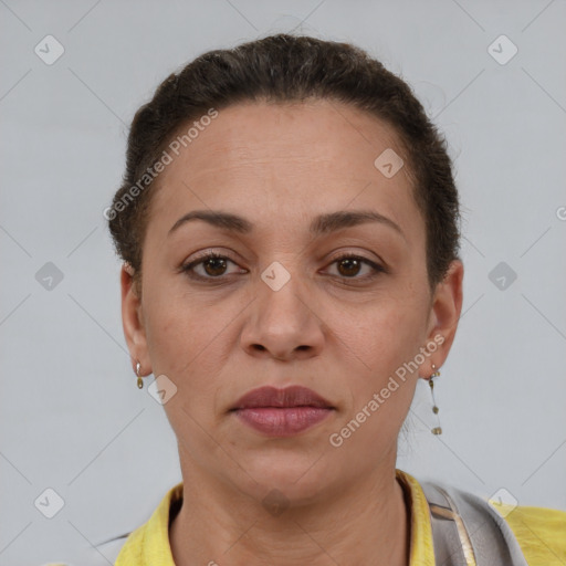 Joyful white adult female with short  brown hair and brown eyes