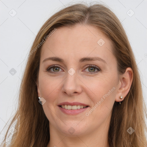 Joyful white young-adult female with long  brown hair and grey eyes