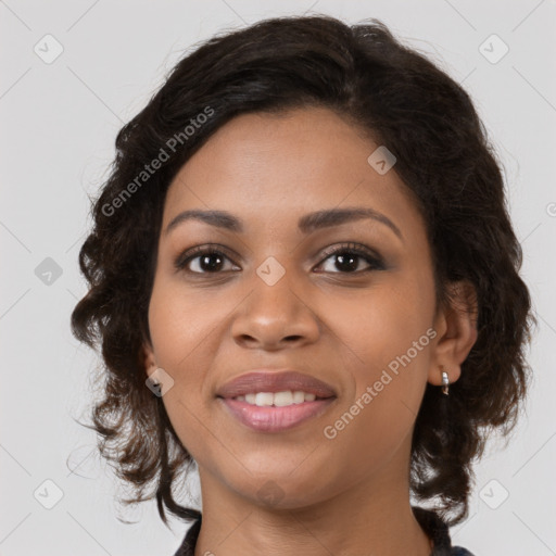 Joyful black young-adult female with medium  brown hair and brown eyes