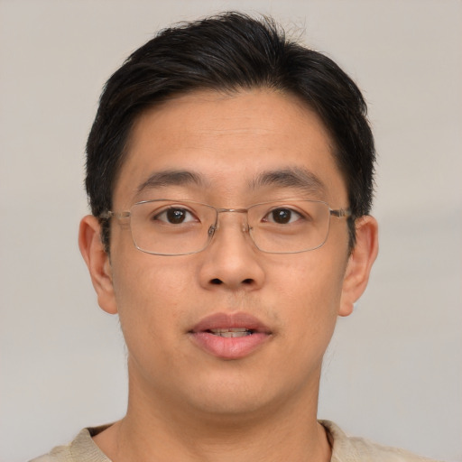 Neutral asian young-adult male with short  brown hair and brown eyes