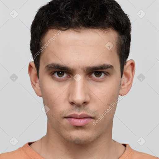 Neutral white young-adult male with short  brown hair and brown eyes