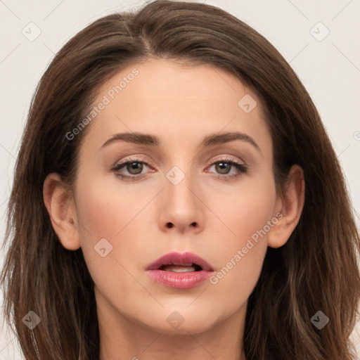 Neutral white young-adult female with long  brown hair and brown eyes