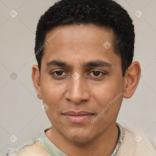 Joyful black young-adult male with short  black hair and brown eyes