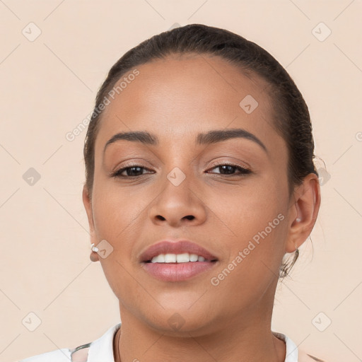 Joyful white young-adult female with short  brown hair and brown eyes