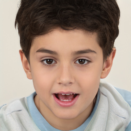 Joyful white child male with short  brown hair and brown eyes