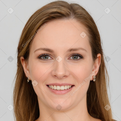 Joyful white young-adult female with long  brown hair and green eyes