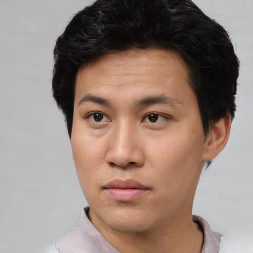 Neutral asian young-adult male with short  black hair and brown eyes