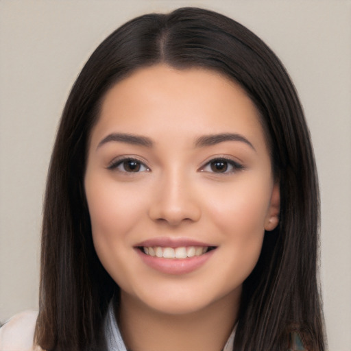 Joyful white young-adult female with long  black hair and brown eyes