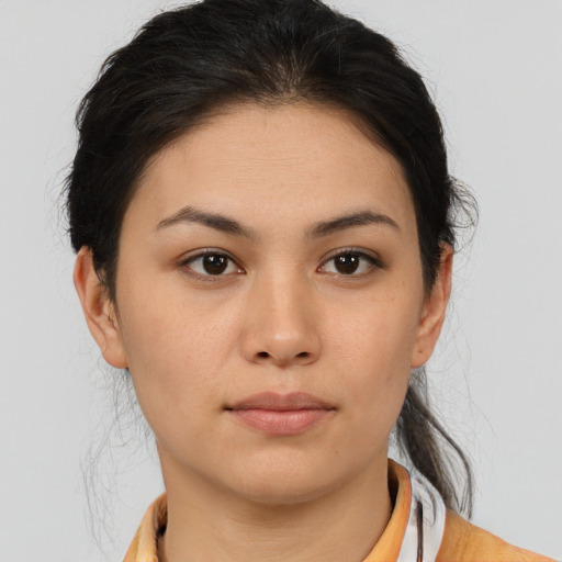 Neutral asian young-adult female with medium  brown hair and brown eyes