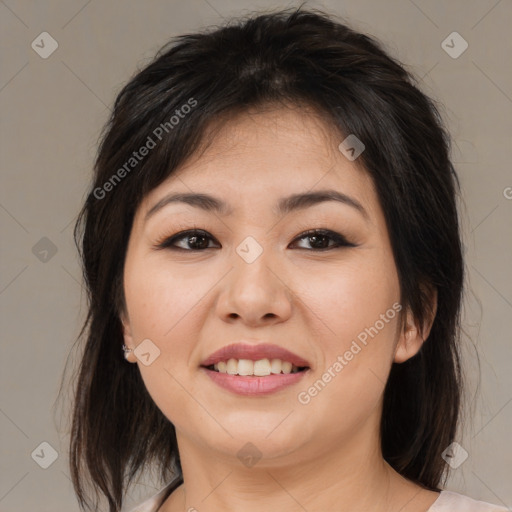 Joyful asian young-adult female with medium  brown hair and brown eyes