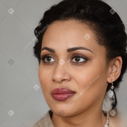 Joyful latino young-adult female with medium  black hair and brown eyes