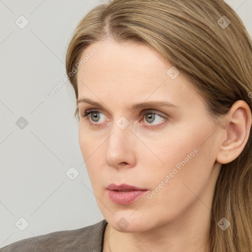 Neutral white young-adult female with long  brown hair and grey eyes