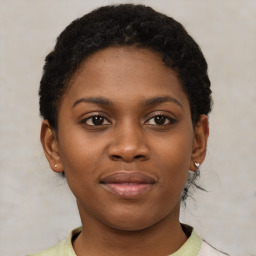 Neutral black young-adult female with short  brown hair and brown eyes