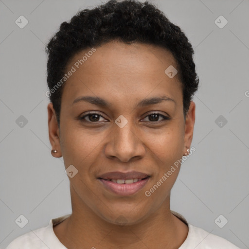 Joyful black young-adult female with short  black hair and brown eyes