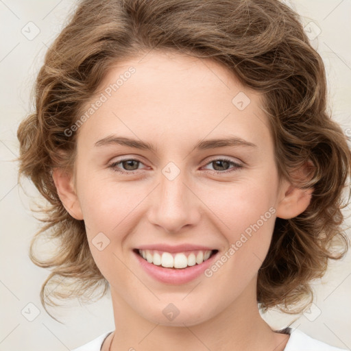 Joyful white young-adult female with medium  brown hair and green eyes