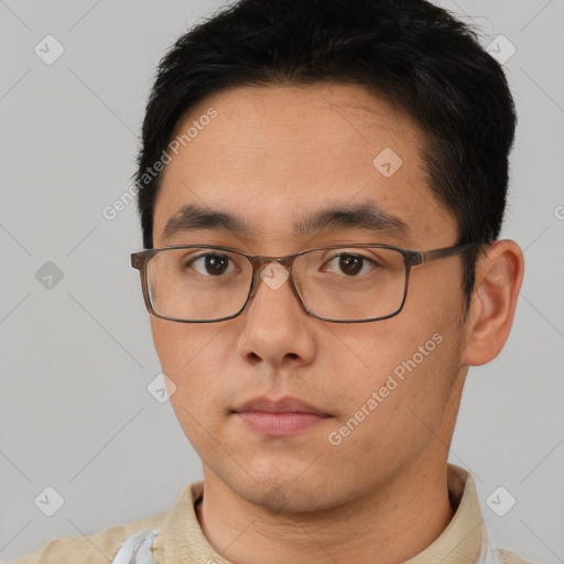 Neutral asian young-adult male with short  brown hair and brown eyes