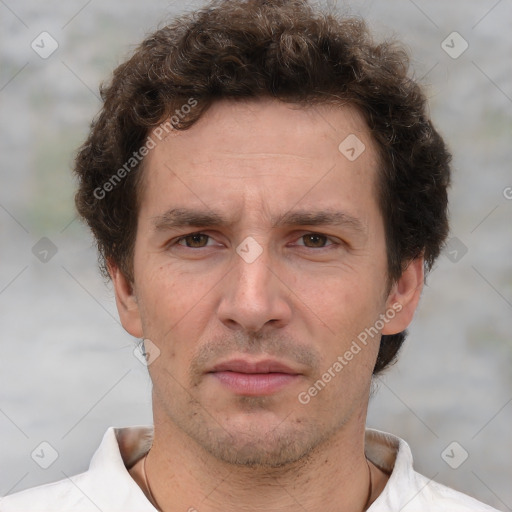 Neutral white adult male with short  brown hair and brown eyes