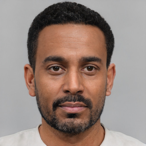 Neutral black young-adult male with short  black hair and brown eyes