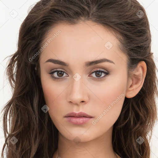 Neutral white young-adult female with long  brown hair and brown eyes