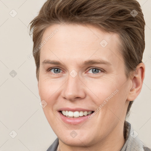 Joyful white young-adult female with short  brown hair and grey eyes