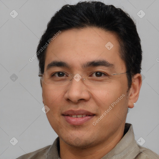 Joyful asian young-adult male with short  brown hair and brown eyes