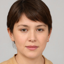 Neutral white young-adult female with short  brown hair and brown eyes