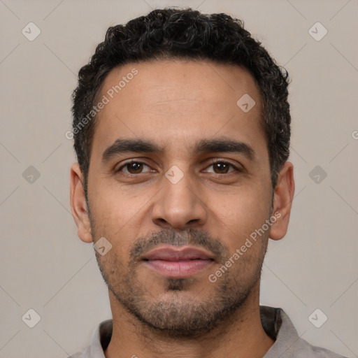 Neutral latino young-adult male with short  black hair and brown eyes