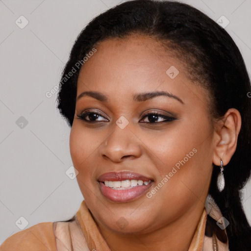 Joyful latino young-adult female with long  brown hair and brown eyes