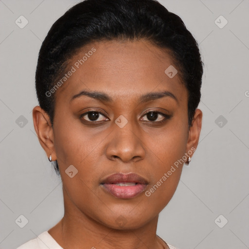 Joyful black young-adult female with short  brown hair and brown eyes