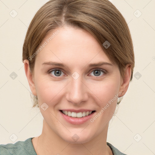 Joyful white young-adult female with medium  brown hair and grey eyes