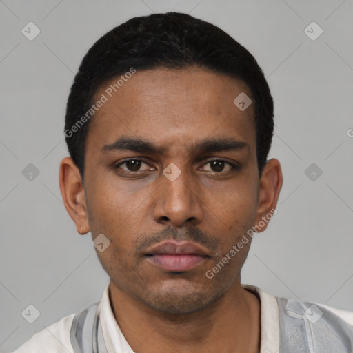 Neutral latino young-adult male with short  black hair and brown eyes