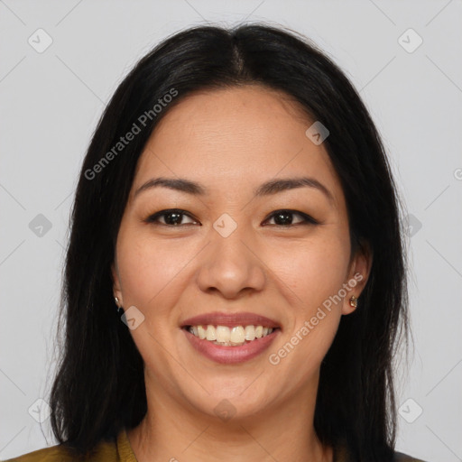 Joyful asian young-adult female with long  brown hair and brown eyes