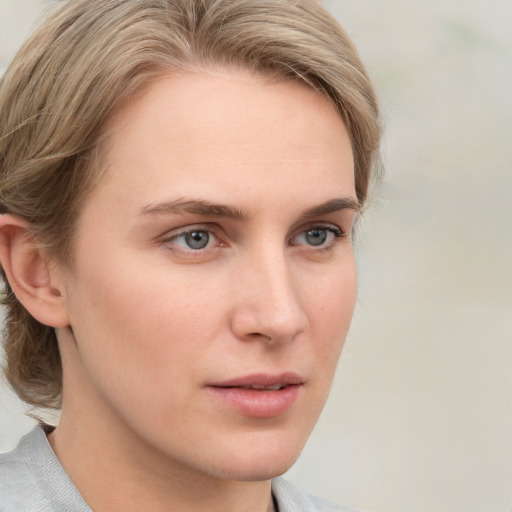 Neutral white young-adult female with medium  brown hair and blue eyes